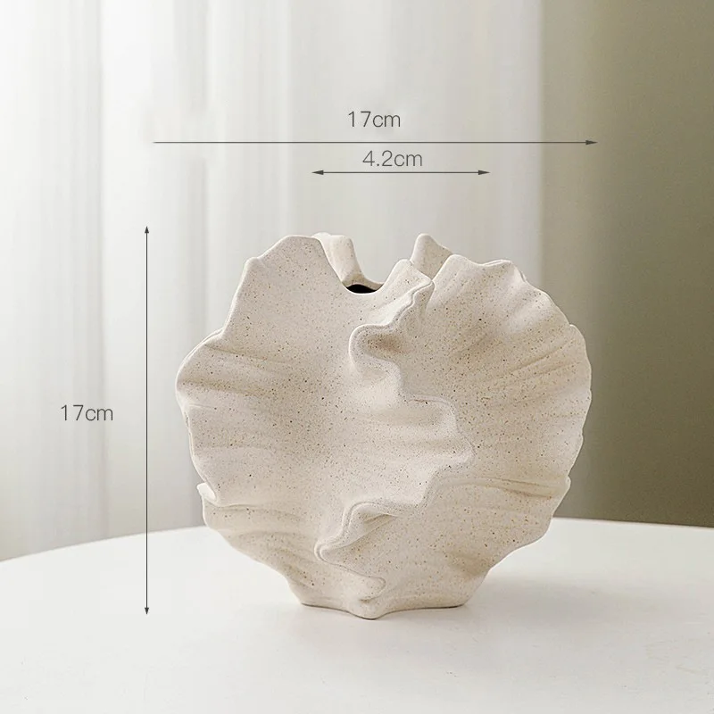 Textured ceramic vase, 17cm tall, 17cm wide, with a 4.2cm opening. Modern home decor.