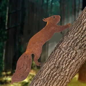 Metal squirrel climbing a tree, garden art.